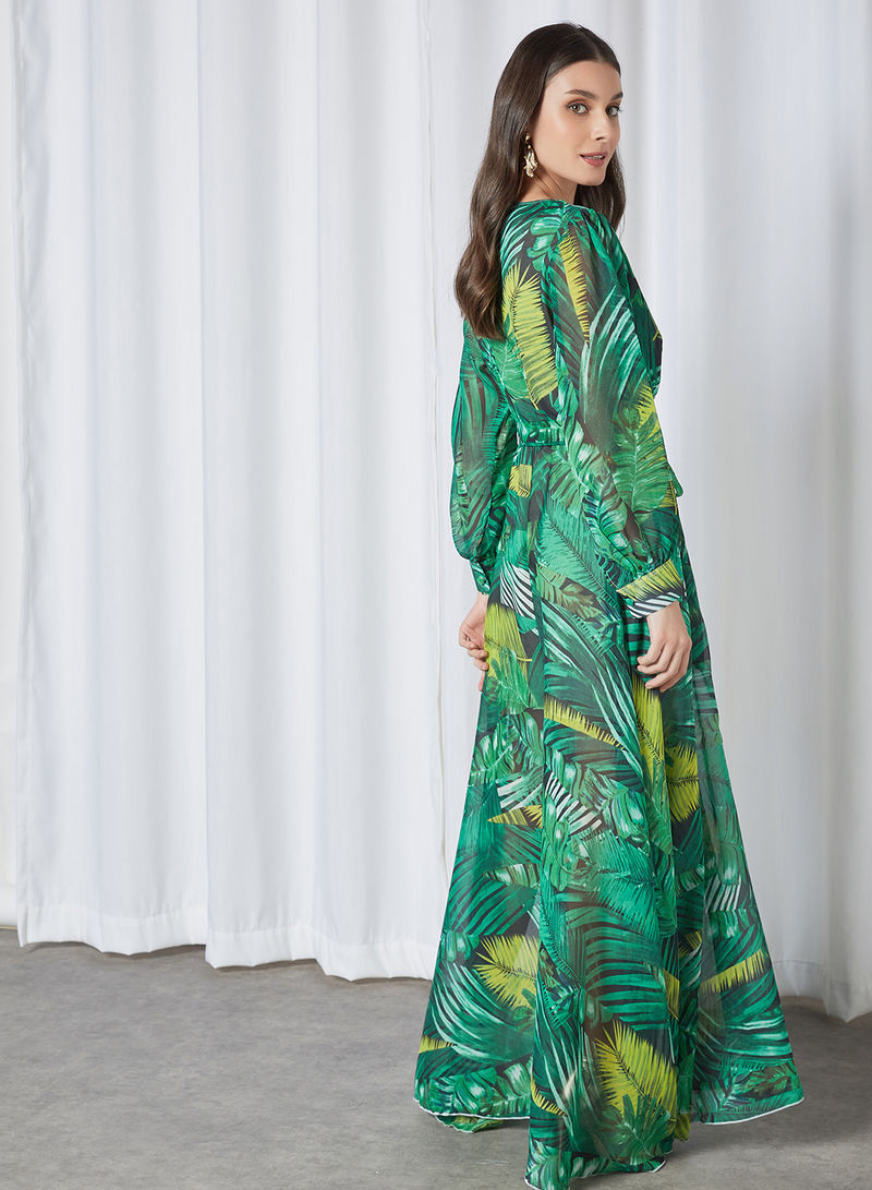 Bsid02-Tropical-inspired maxi dress featuring an overlap neckline with empire waist and tie-on belt