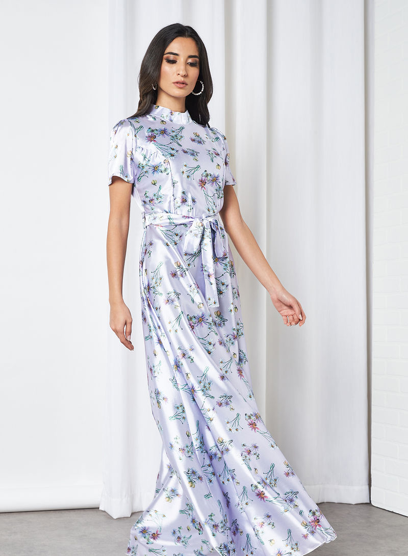 Bsid03-Light mauve floral-printed maxidress featuring a high neckline with short sleeves. Comes with a belt