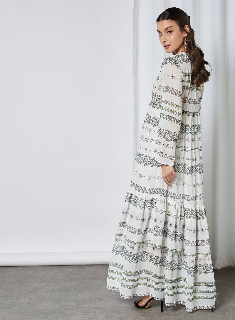 Bsid23-Off-white printed maxi dress with tiered skirt and long sleeves